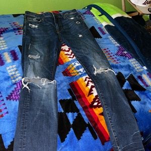 Dark blue Ripped skinny jeans that’s in good condition, Worn only a few times